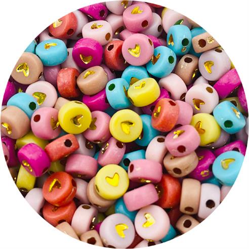 MIX koraliki złote serce 7mm / akrylowe / 7x3mm / 13,5g / 100szt-12345