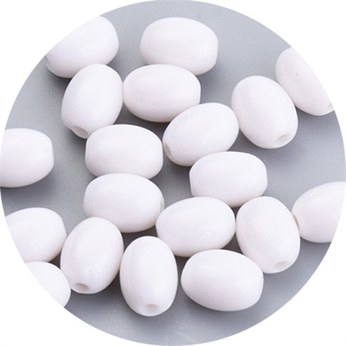 Koraliki owalne oliwki akrylowe białe 9x7mm 50szt-13500